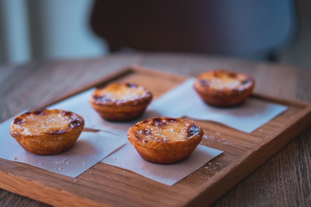 Custard tarts dusted with cinnamon