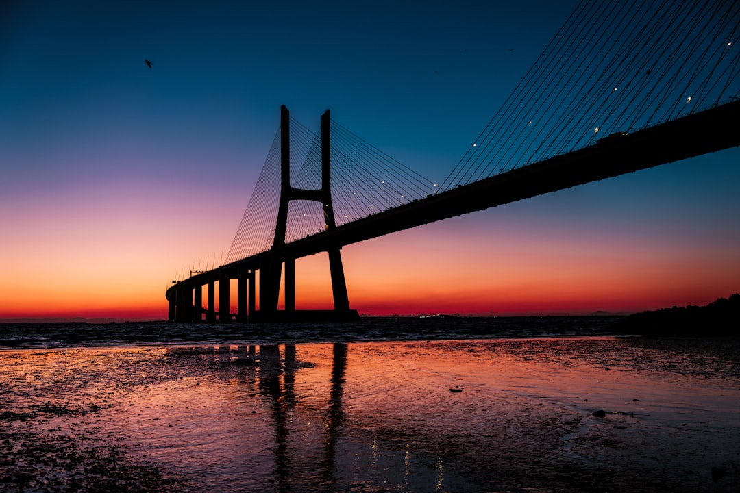 The 25 de Abril Bridge over the Tagus at sunset