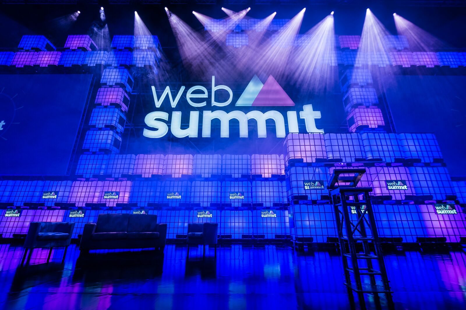 The Web Summit stage set lit up before doors open, with seating in front